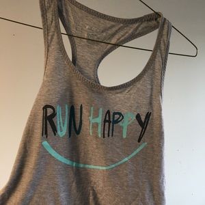 Brooks grey running tank, xSmall,  front reads “Run Happy”